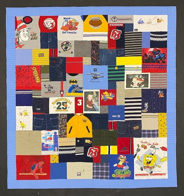 Memorial quilt made from a small boy's clothing. 